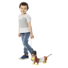 Slinky Disney Toy Story 4 dog with attached leash supports interactive play sessions.