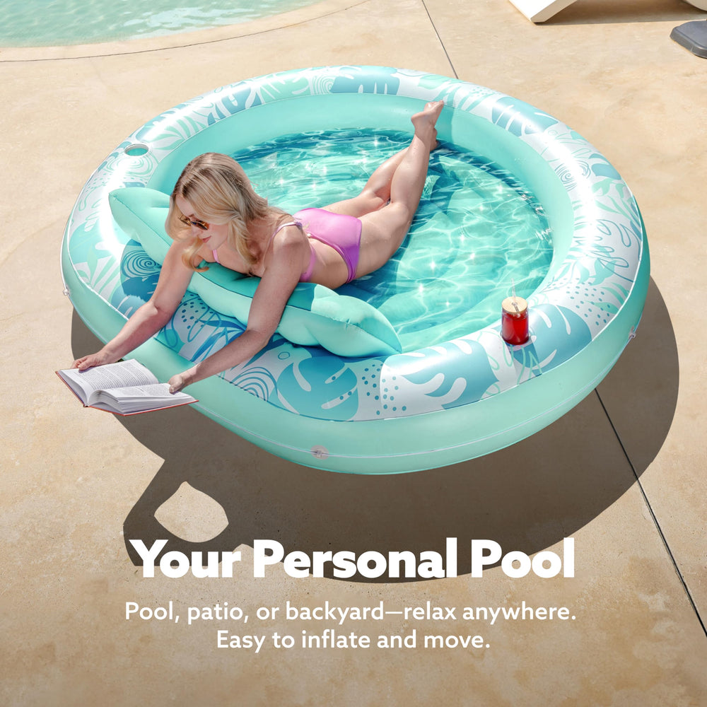 Sloosh centerpiece floating platform enhances pool gatherings with a stable, focal lounging area
