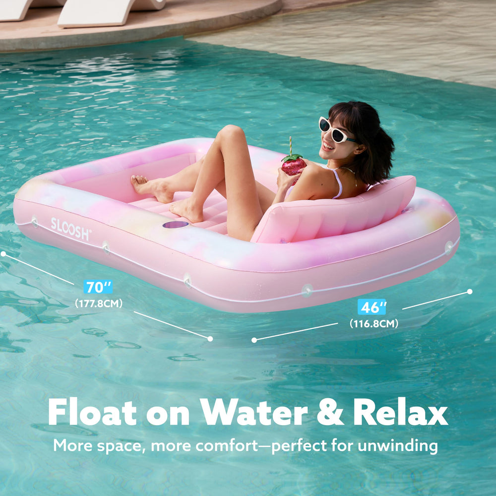 Sloosh compact portable sun tanning pool in blue daisy, quick to inflate for trips.