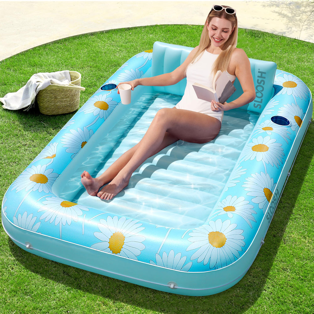 Sloosh inflatable tanning pool lounger in blue marble for solo sunbathing by the pool.