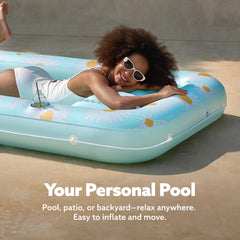 Sloosh pool float with removable pillow provides ergonomic comfort for uninterrupted reading.