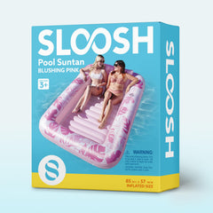 Sloosh XL tanning pool float as a stylish centerpiece for outdoor parties.