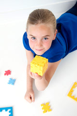 SmartGames Happy Cube Pro shows six difficulty levels for progressive brain challenge.