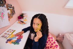 SmartGames IQ Jigsaw challenge booklet accompanies the colorful pieces for guided progress.