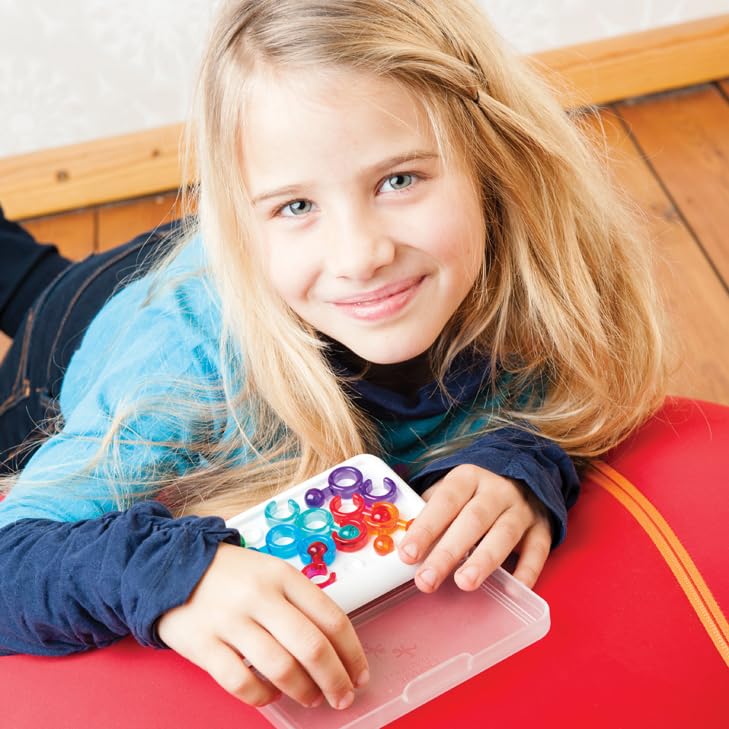 IQ Link puzzle pieces in candy colors for engaging spatial challenges.