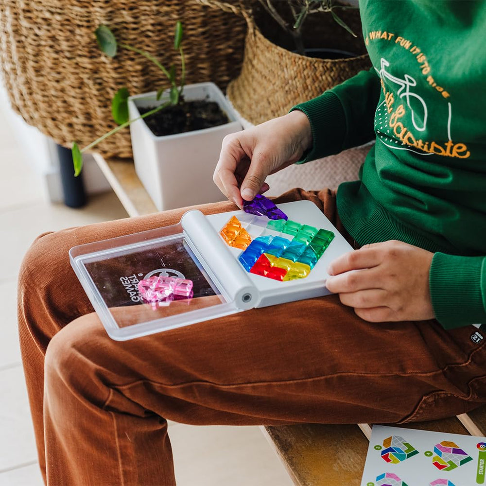 SmartGames IQ Love jewel pieces in bright colors for engaging puzzles.