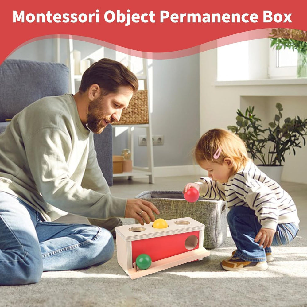 Smartwo object permanence box in use by a toddler during exploration.