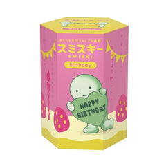 Smiski Birthday Series glow-in-the-dark mini figure emerging from a sealed surprise box.