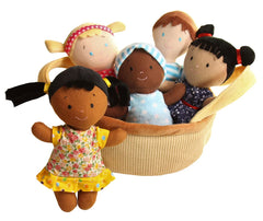 Snuggle Stuffs diversity dolls wearing bright outfits for inclusive pretend play.
