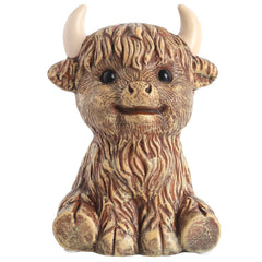 SOBEIT Highland Cow Piggy Bank room décor boosts shelf appeal in nursery or bedroom.