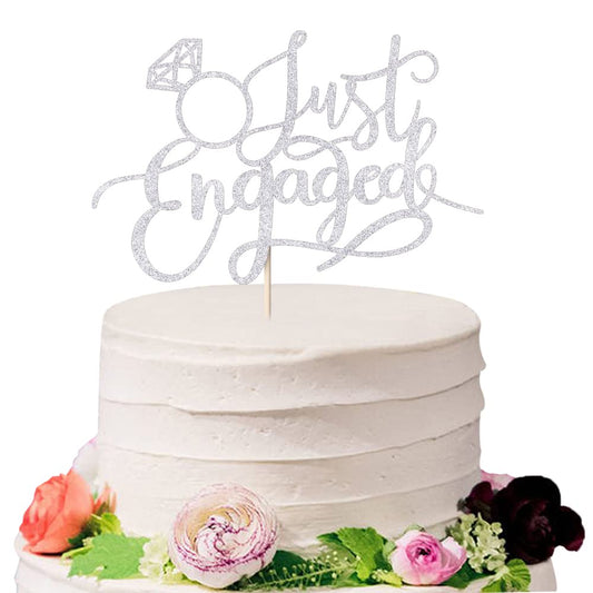 Sodasos Just Engaged cake topper in silver adds sparkle to the engagement cake.