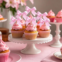 Solldgt pink bow cupcake topper brings whimsy to girly birthdays.