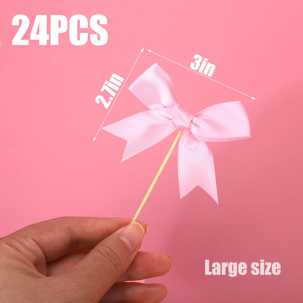 Solldgt pink bow cupcake topper with hidden toothpick for easy insertion.