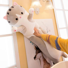Somao long cat pillow on a bed creates a cozy ambience for restful evenings.