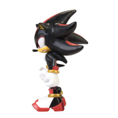 Compact 2.5-inch Shadow figure displayed on a shelf in a themed Sonic setup.
