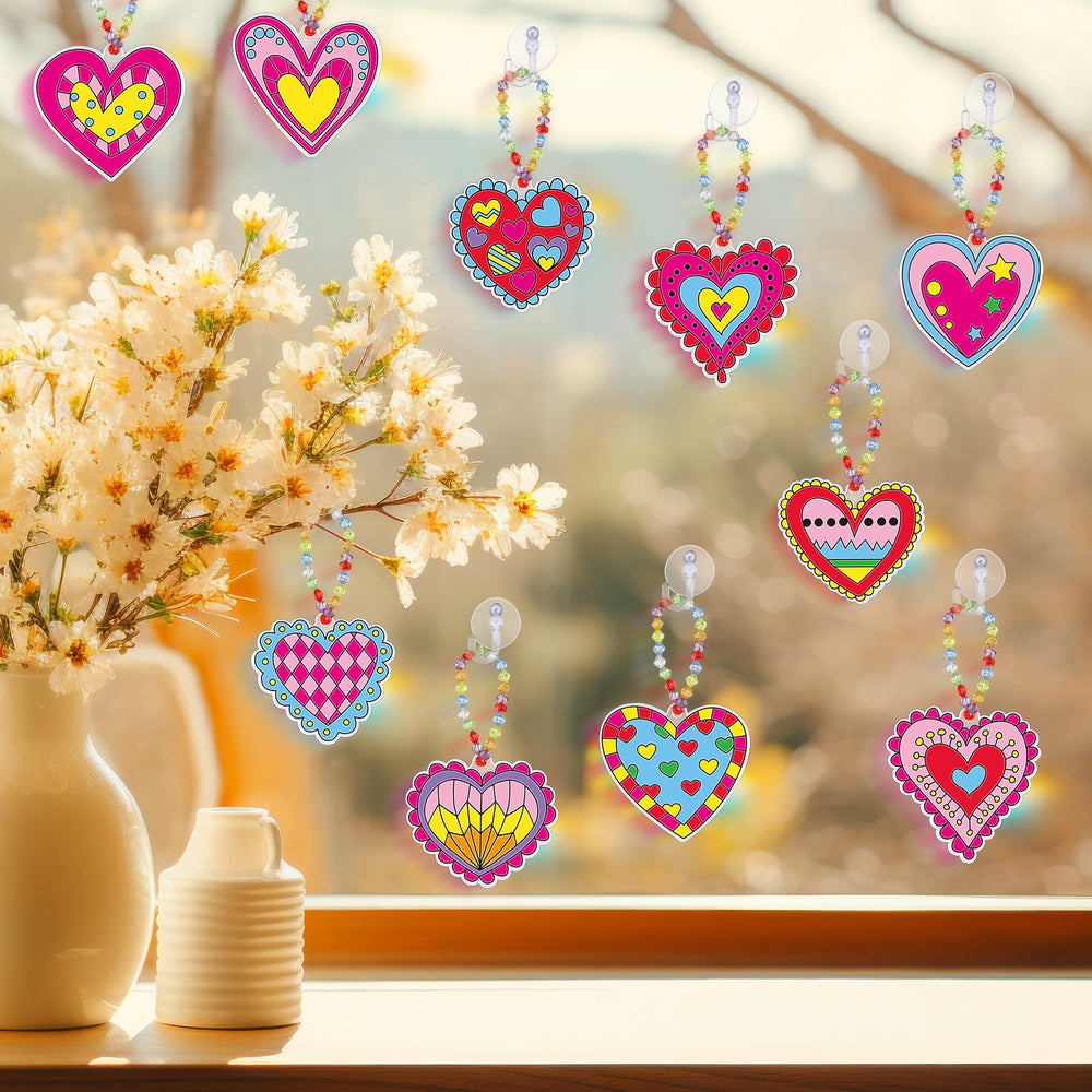 Sonwyoung suction cup hooks keep finished crafts secure on windows.