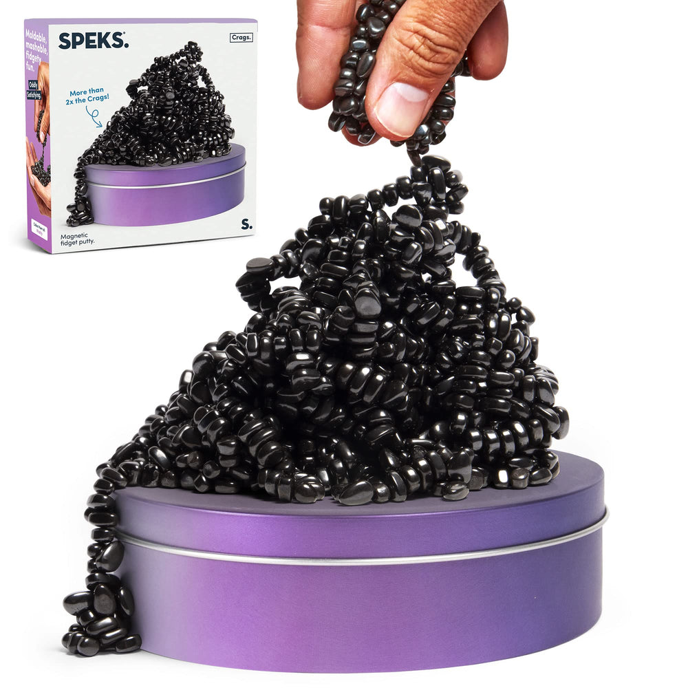 Speks Crags ferrite stones in a metal tin for calm focus during work