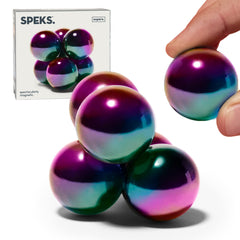 Speks Supers magnetic balls on a clean desk, ideal for focused fidgeting.