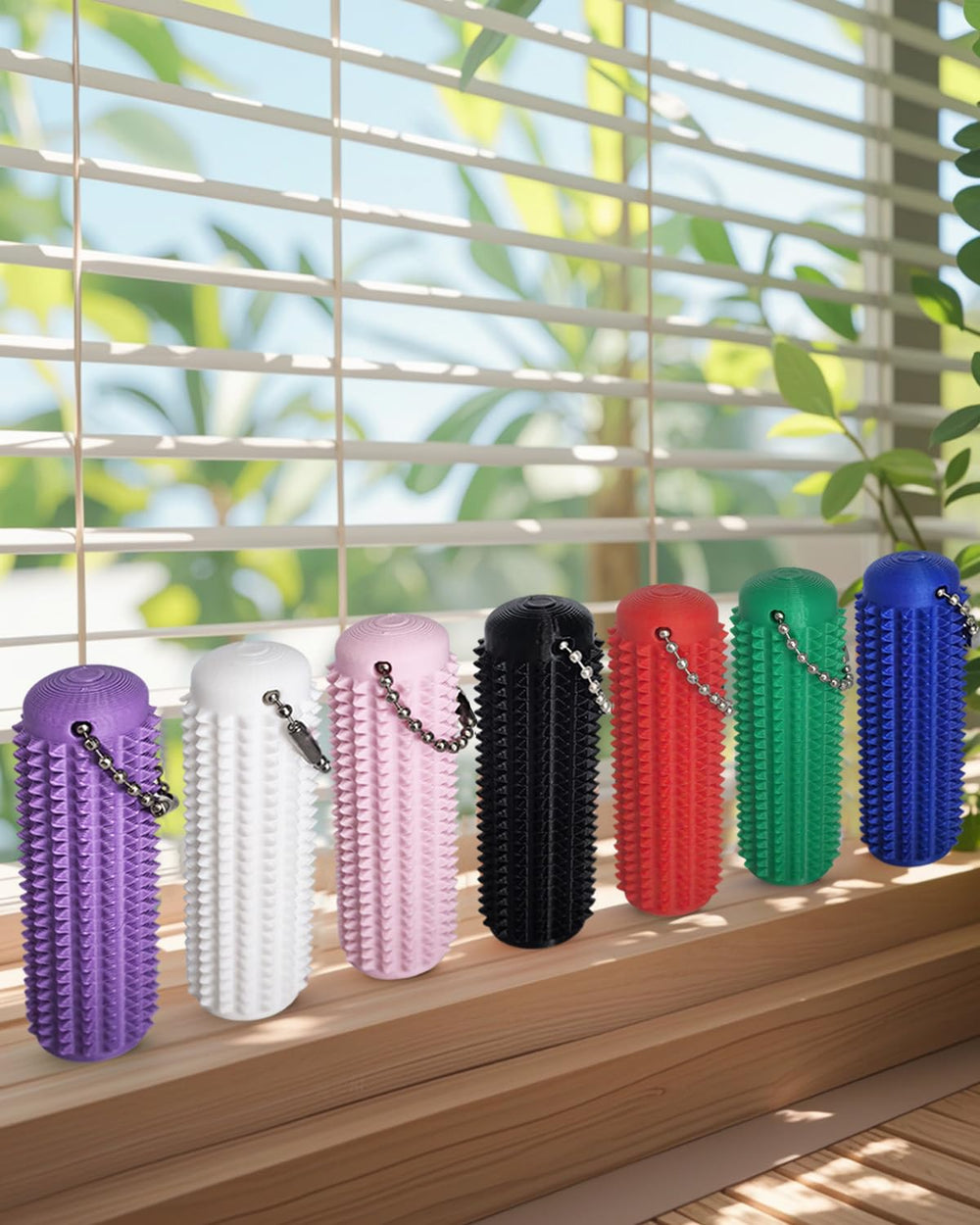 spicssa Little Ouchies silent roller for discreet anxiety relief at work.