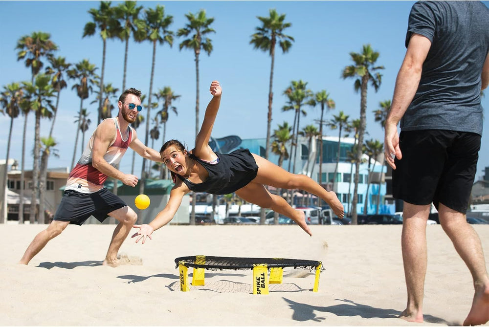 Beach play with Spikeball set illustrates sand-friendly practice.