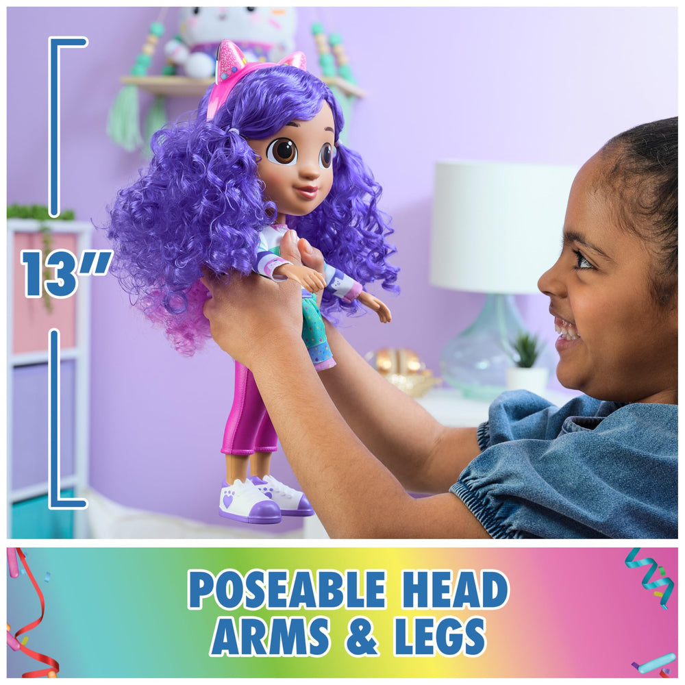 Spin Master Gabby chest button triggers show-like sound effects.