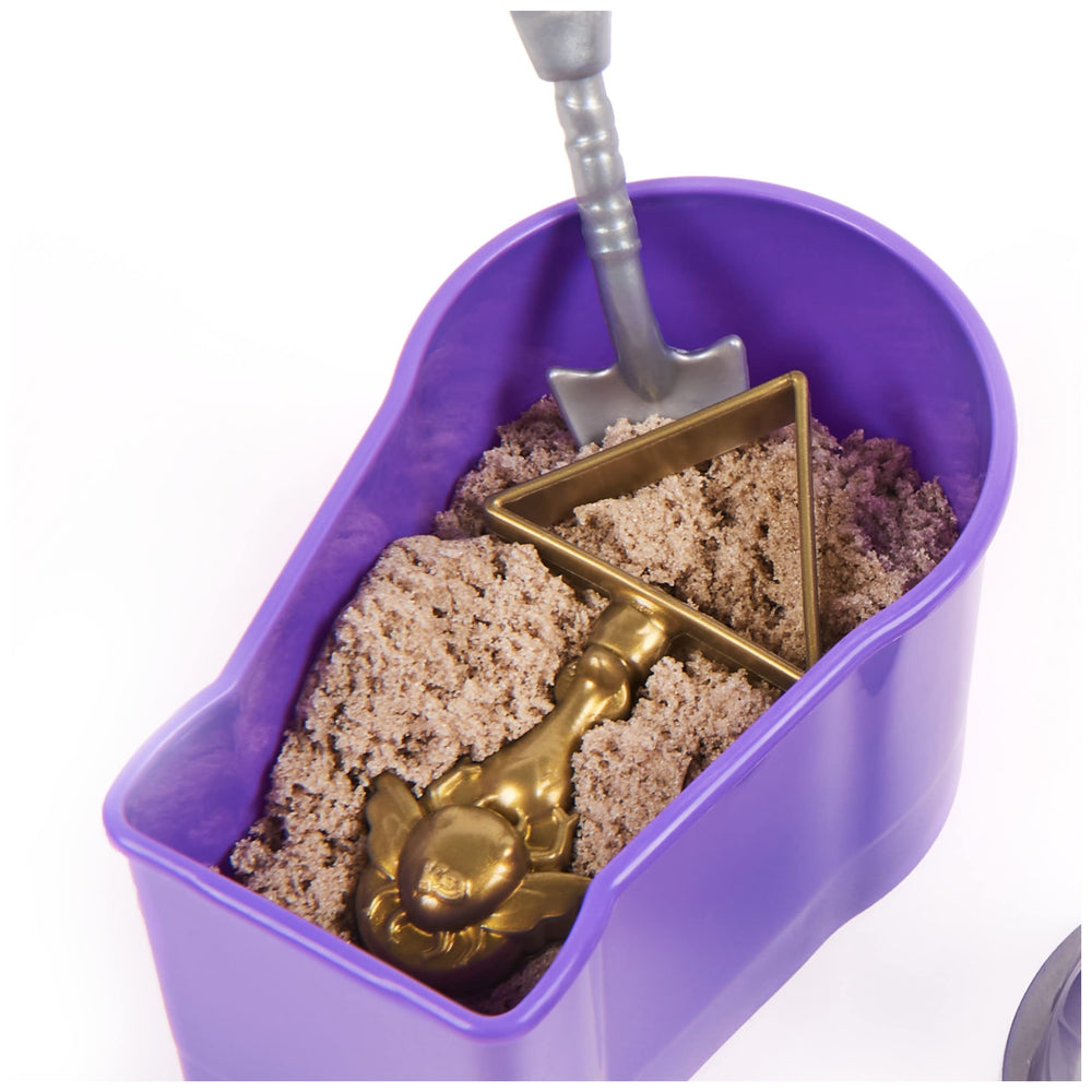 Spin Master Kinetic Sand 2-in-1 tool supports shaping and scooping adventures.