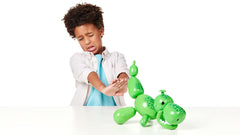 Squeakee Dino in a Tug of War pose for friendly competition.