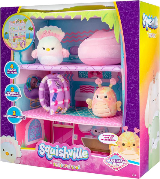 Squishville Blue Seas Inn suitcase with Balia the butterfly for portable pretend travel.