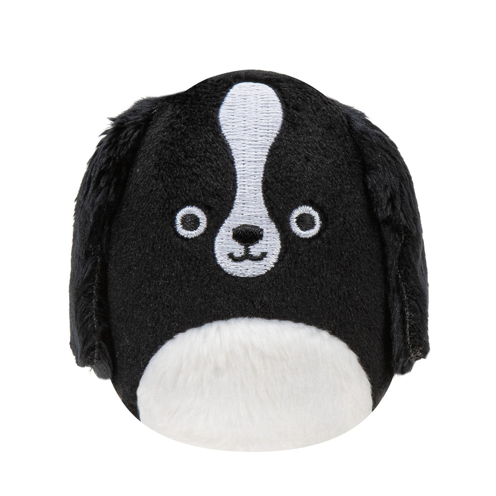 Close-up of Squishville 2-inch plush, showing soft fabric