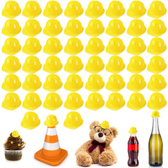 Sratte yellow miniature construction hats as bottle toppers for festive decor