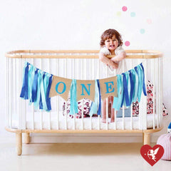 SS Cohen birthday photo backdrop creates a charming setting for first-year portraits.