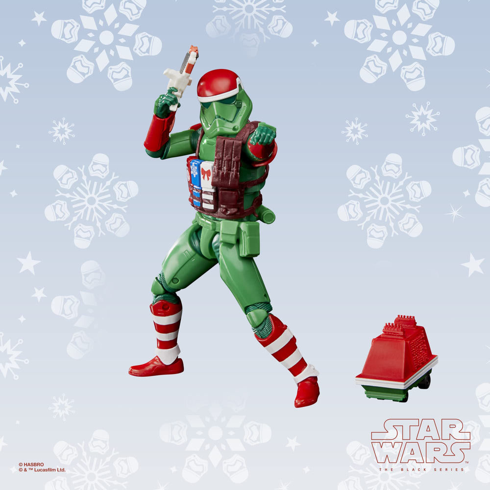 STAR WARS Holiday Edition blaster accessory completes the figure’s action-ready look.