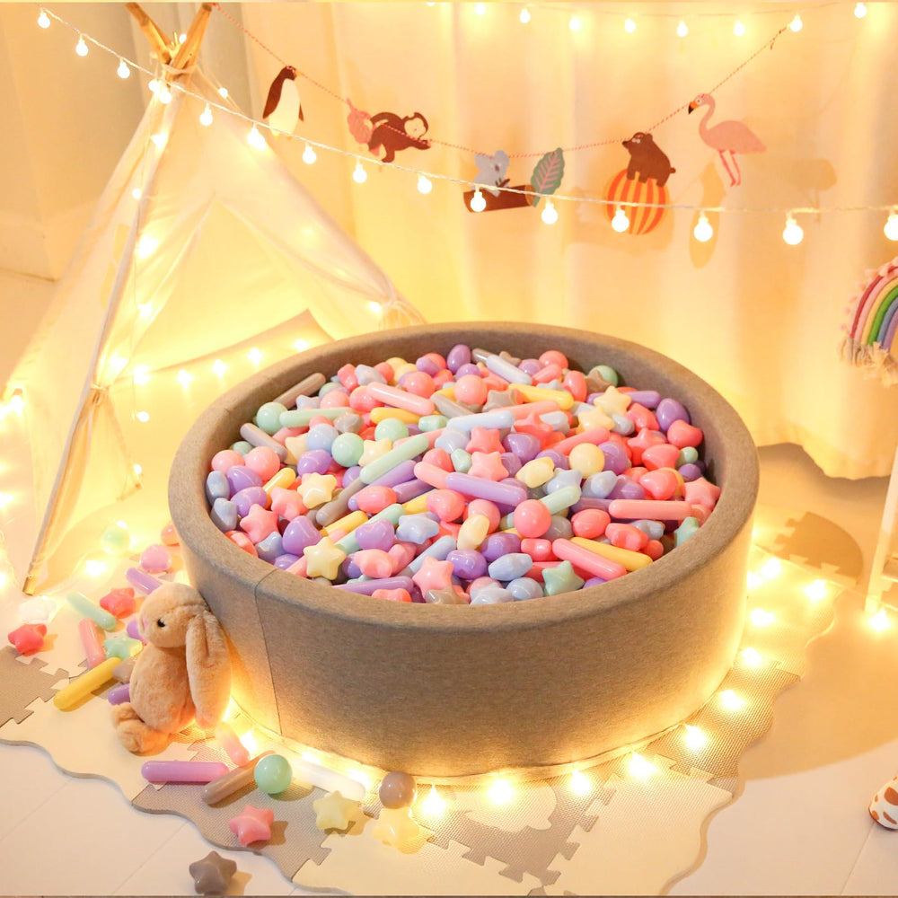 STARBOLO balls in water pool provide splash-friendly sensory fun.