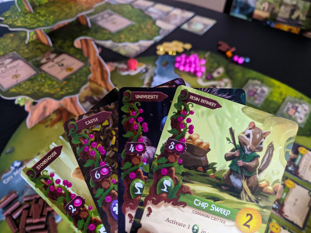 Starling Games Everdell tokens and resources provide tactile components during play.