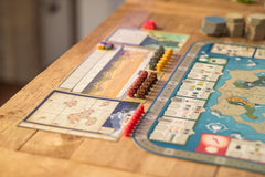 Stonemaier Tapestry components and tiles ensure engaging setup.