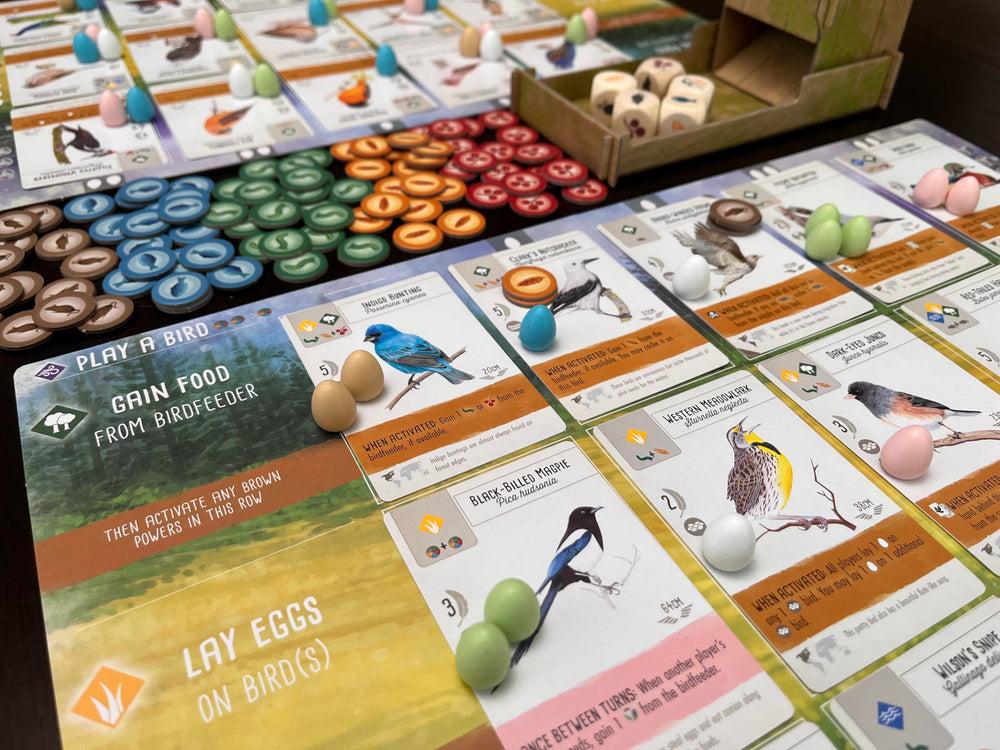 Stonemaier Wingspan artwork illustrations, lush visuals enriching table presence and theme.