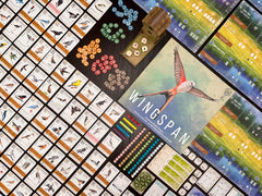Stonemaier Wingspan playmat habitat, clear zones guiding actions and bird placement.