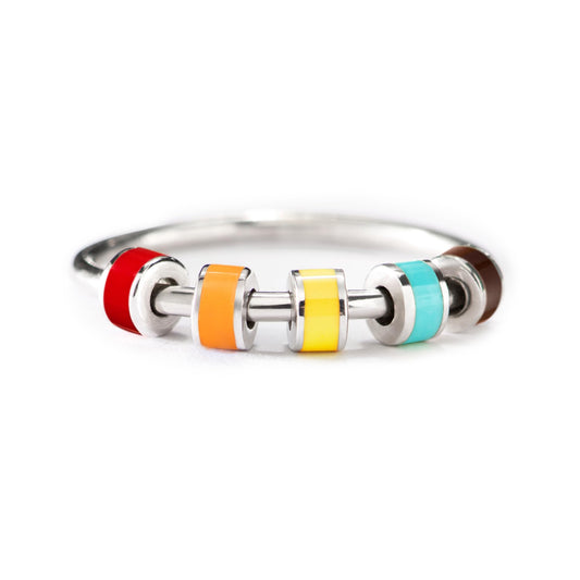 StoryJewellery fidget ring closeup with enamel detail for discreet calm
