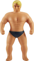 STRETCH ARMSTRONG original giant toy bent into shapes for imaginative play.