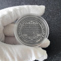 Strugglejewelry medallion showing Traveler's Prayer engraving for guidance.