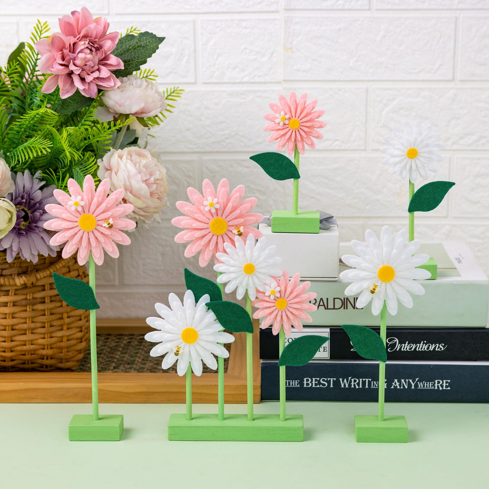 SUNBEAUTY pink daisy centerpieces add charm to birthday tables.