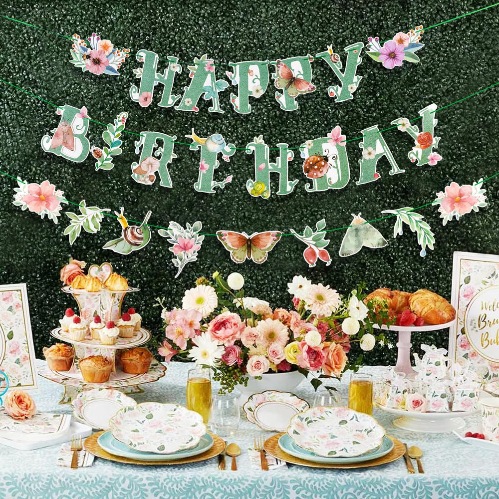 SUNBEAUTY floral accents and butterflies decorate a party backdrop.