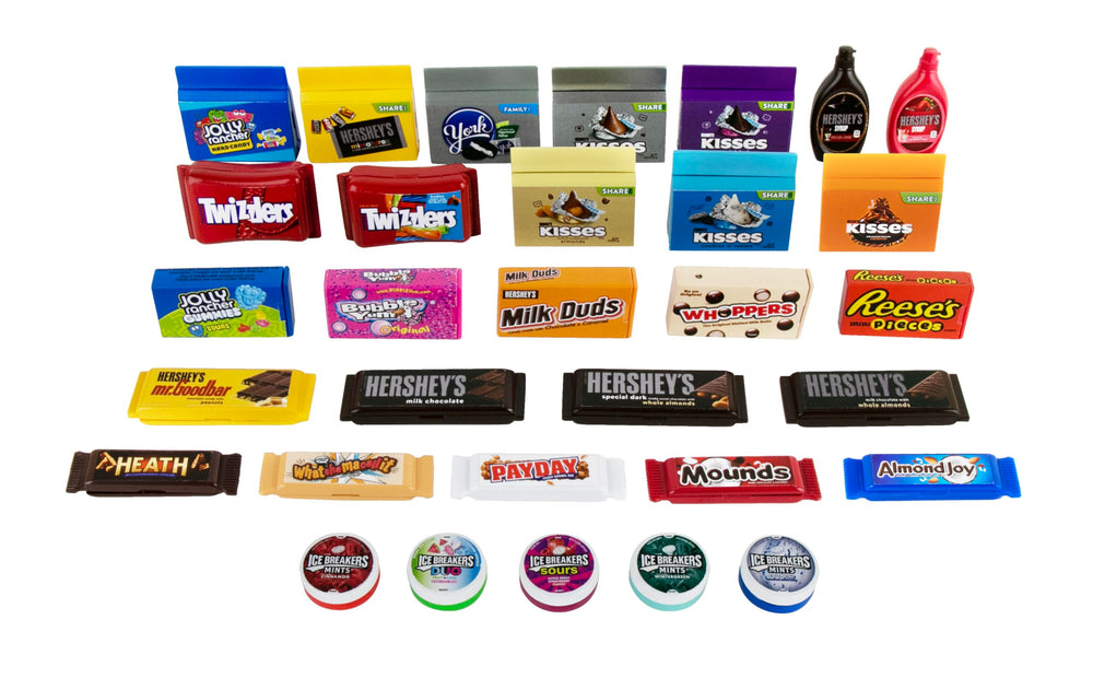 Reese’s Pieces mini inside—collectible charm for desk or shelf.