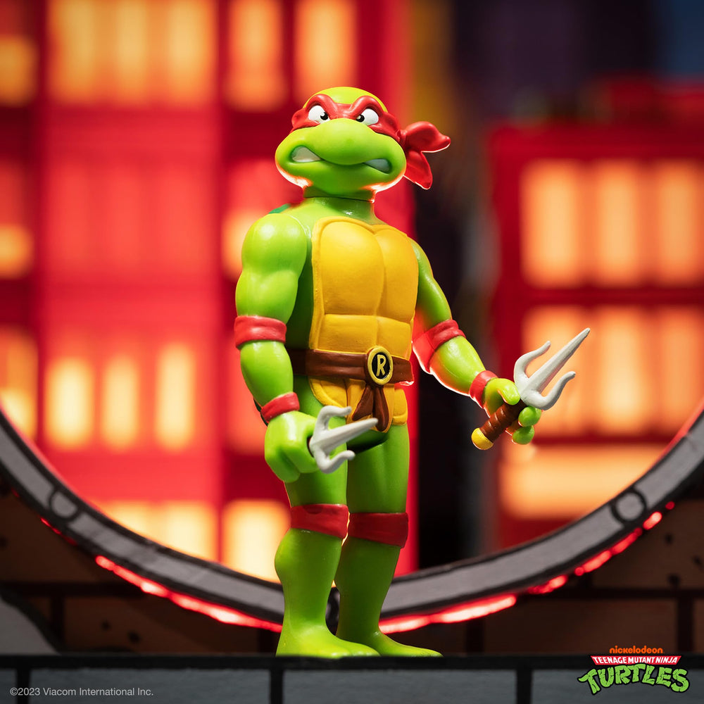 Raphael palm-size display readiness for shelf or desk enjoyment by fans.