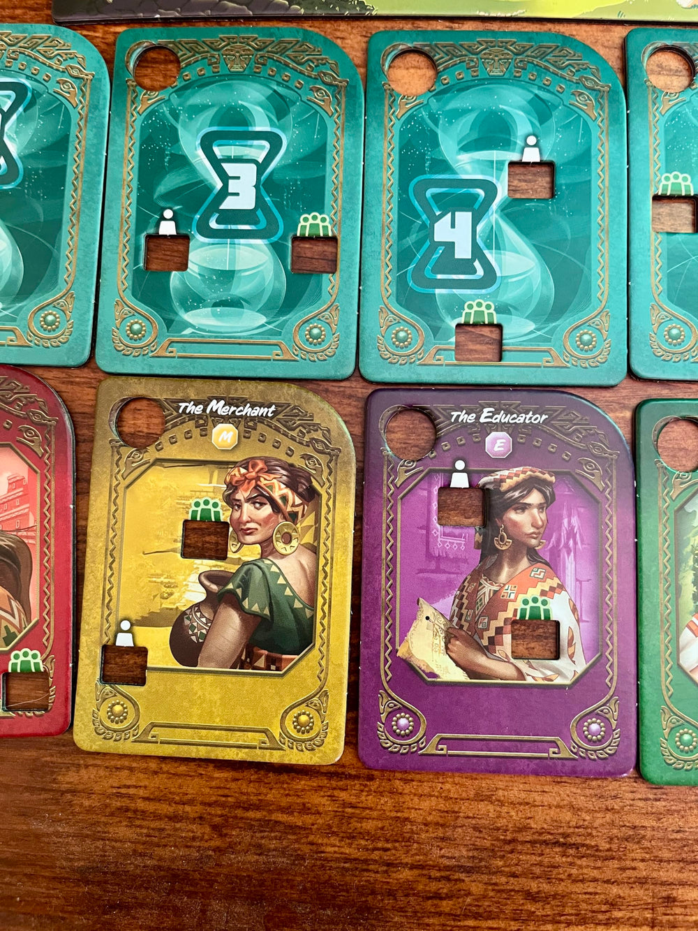 Clues tiles in Kronologic setup highlight careful alignment of evidence.