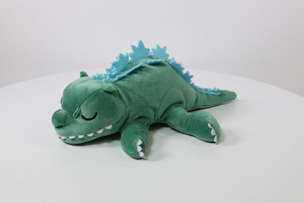 Felt eyes detail on Surreal Entertainment Godzilla sleeping plush for charm.