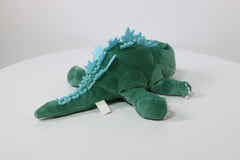 Surreal Entertainment Godzilla plush shows sleepy smile for gentle play.