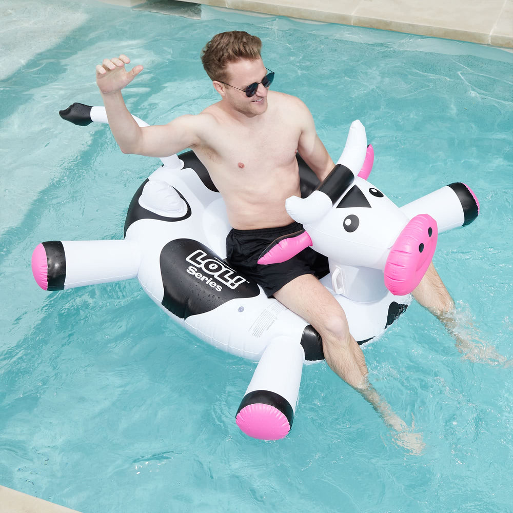 Swimline LOL Cow float side view highlighting wings and balanced design.