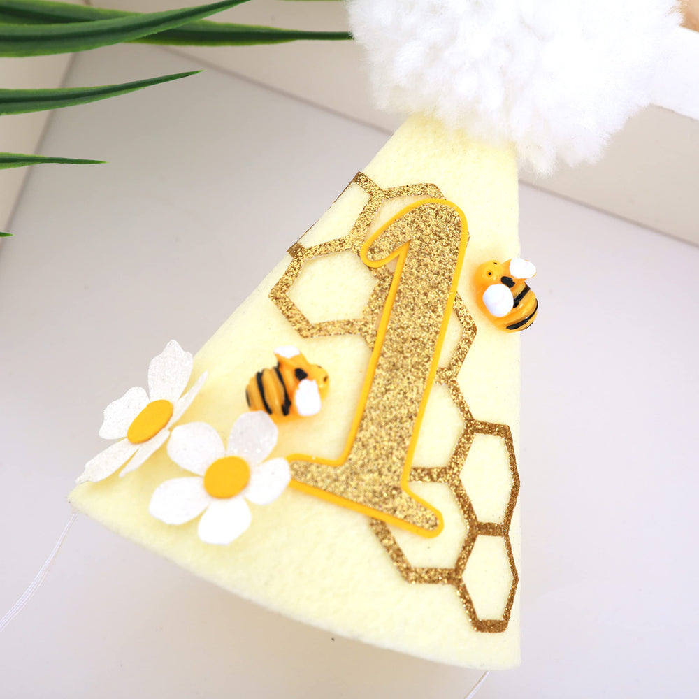 SYESQL bee-themed birthday hat front with numeral 1 for first birthdays.