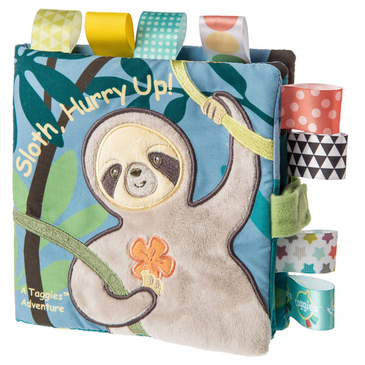 Taggies soft book cover with Molasses Sloth appliquΓ© for cozy storytelling.